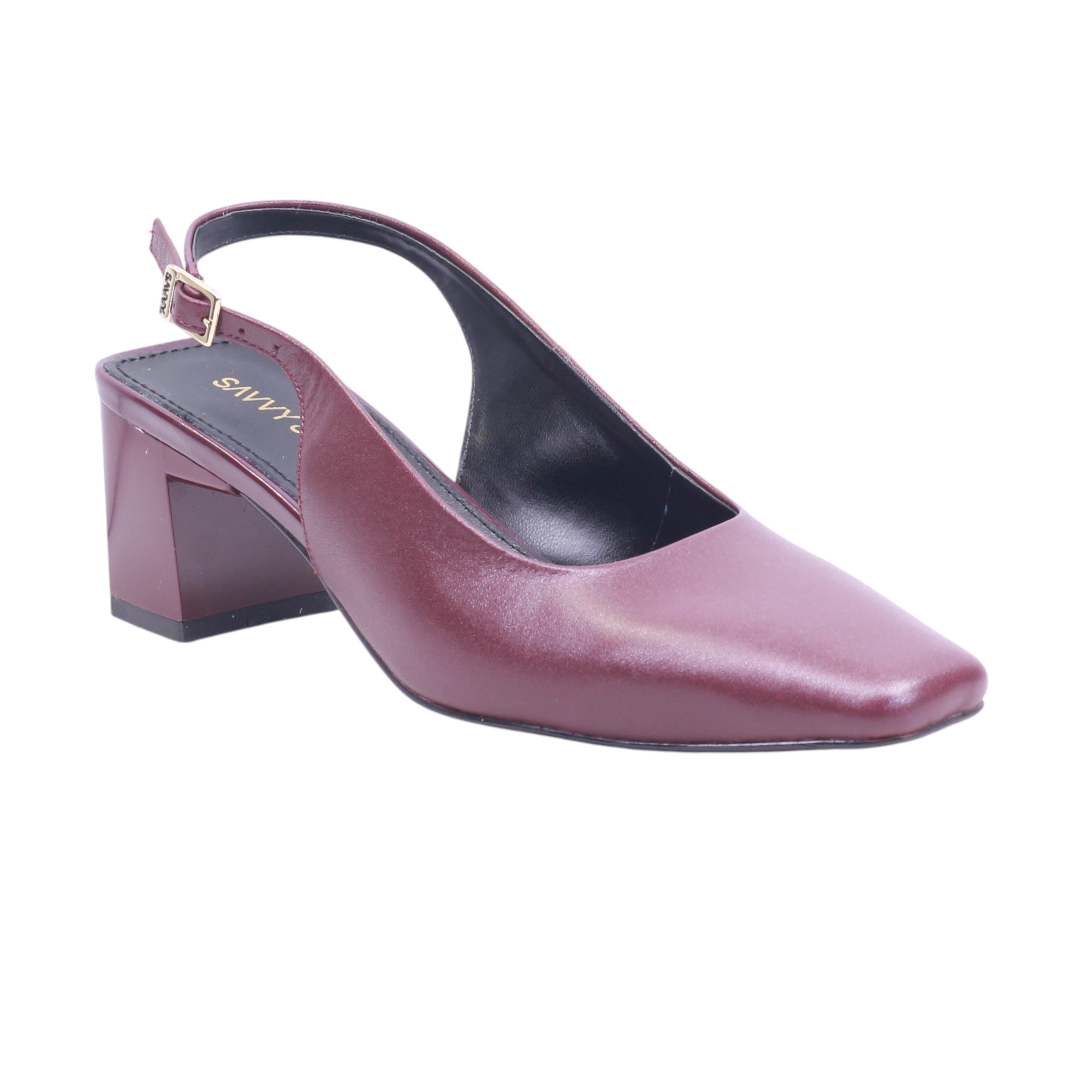 Calzado destalonado con tira trasera y tacón medio